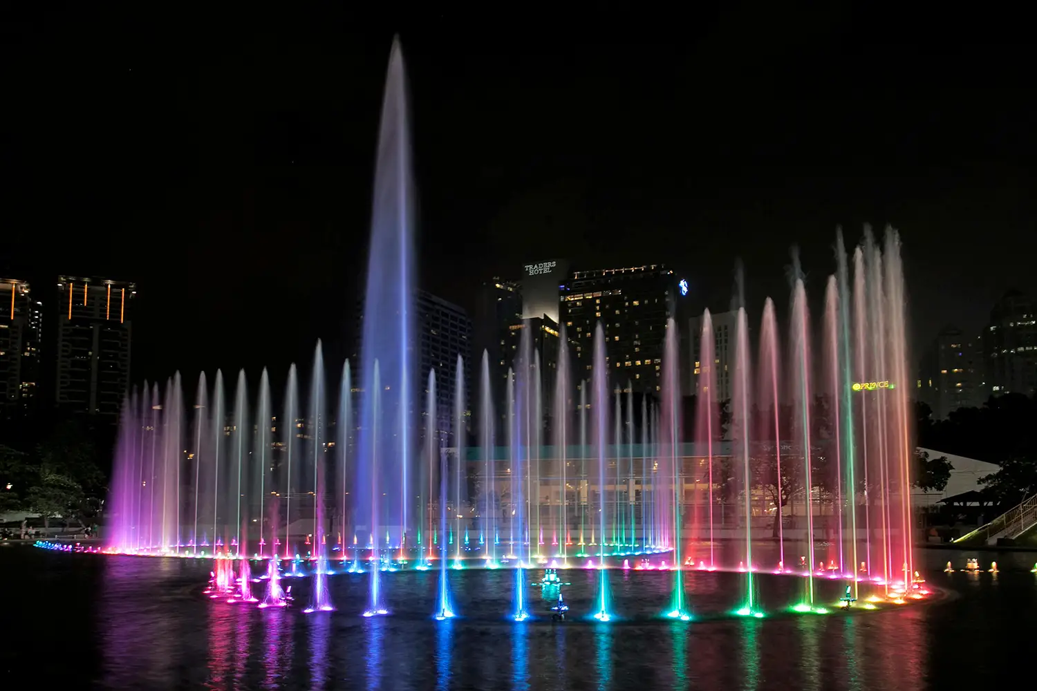 Rigorous Fluid Control Empowering Municipal Engineering and Landmark Water Features 9 Large-scale colorful musical fountain system at night, demonstrating industrial PVC valves and fittings fluid control applications in municipal engineering and landscape water features