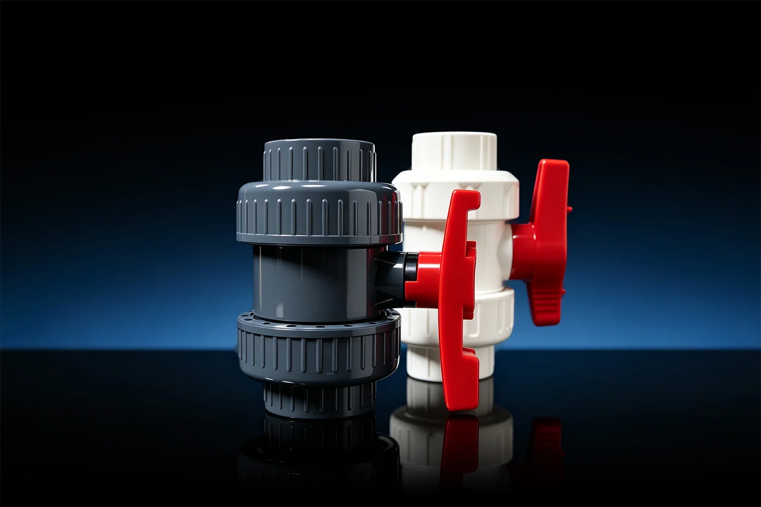 PVC-U True Union Ball Valves 1 Gray and white PVC-U true union ball valves with manual handles for water treatment and industrial piping